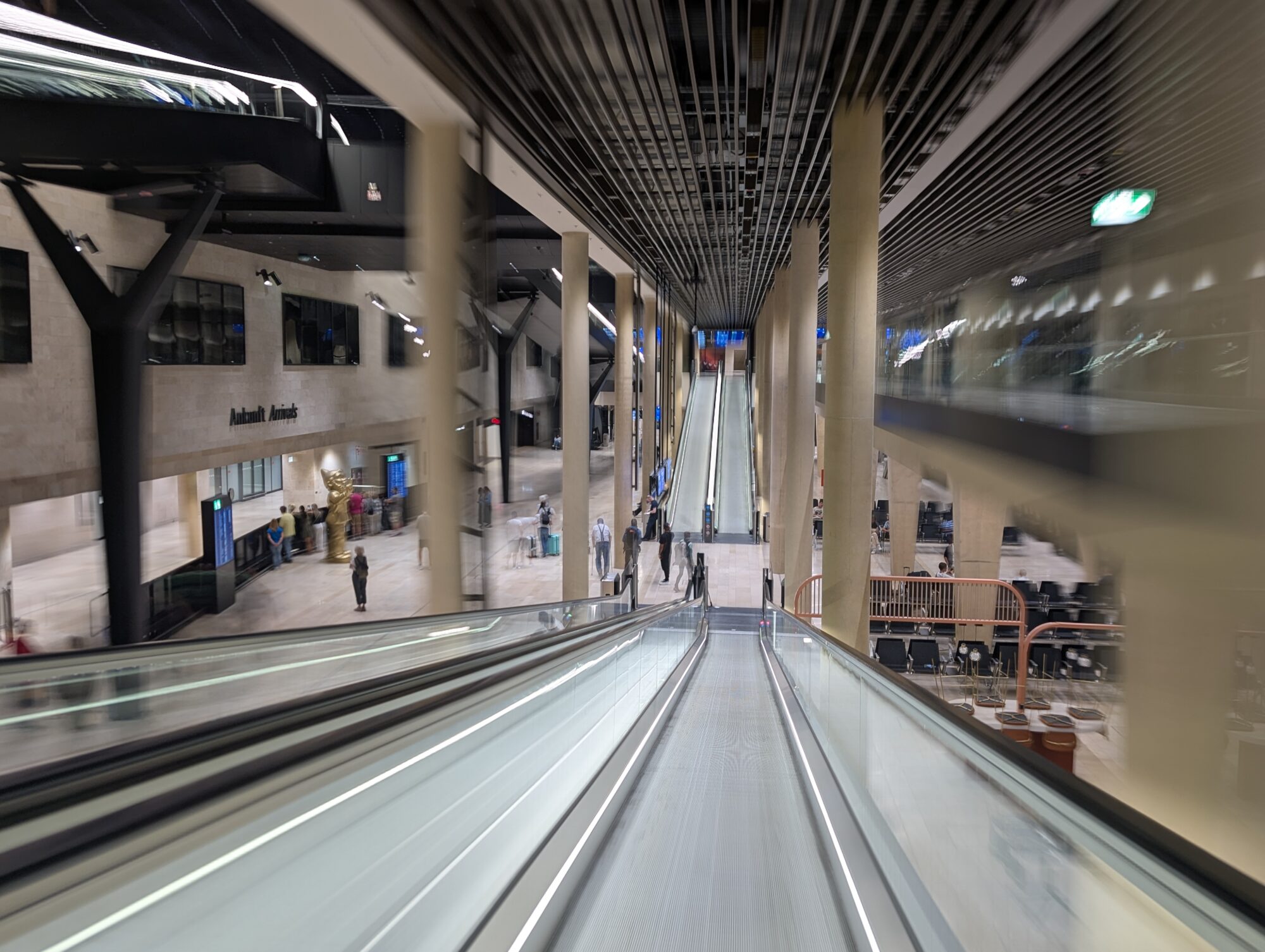 Frankfurt Airport moving walkway going down and up, at night, during my travel back from JavaZone